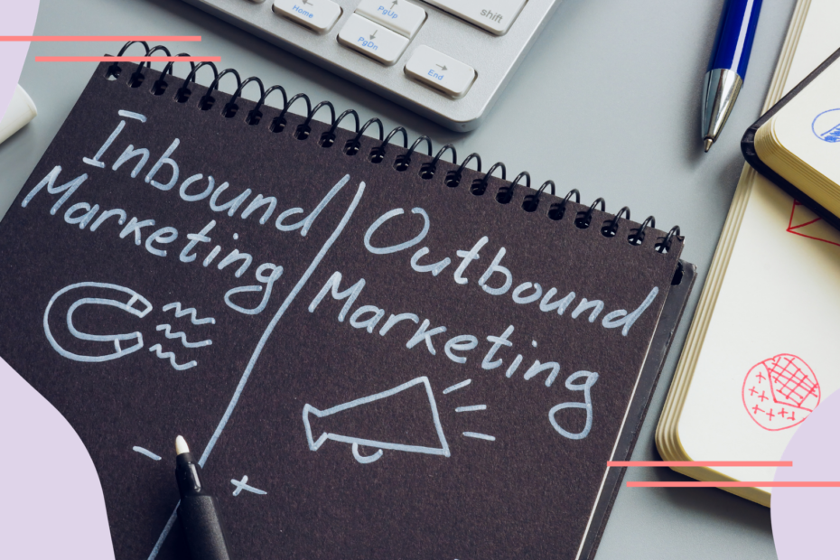 A picture of a notebook with "inbound marketing" written on one side with a drawing of a magnet and "outbound marketing" written on the other side with a drawing of a megaphone.